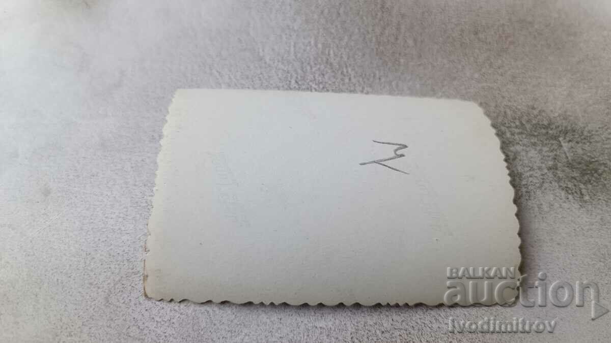 Photo Sofia Two men and three children in front of wooden barrels with price 2.35 BGN | € 1.20