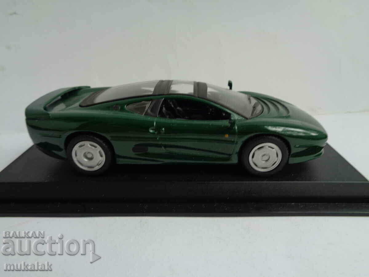 Auction 1:43 JAGUAR XJ 220 TROLLEY TOY MODEL Auction 1:43 JAGUAR XJ 220 TROLLEY TOY MODEL