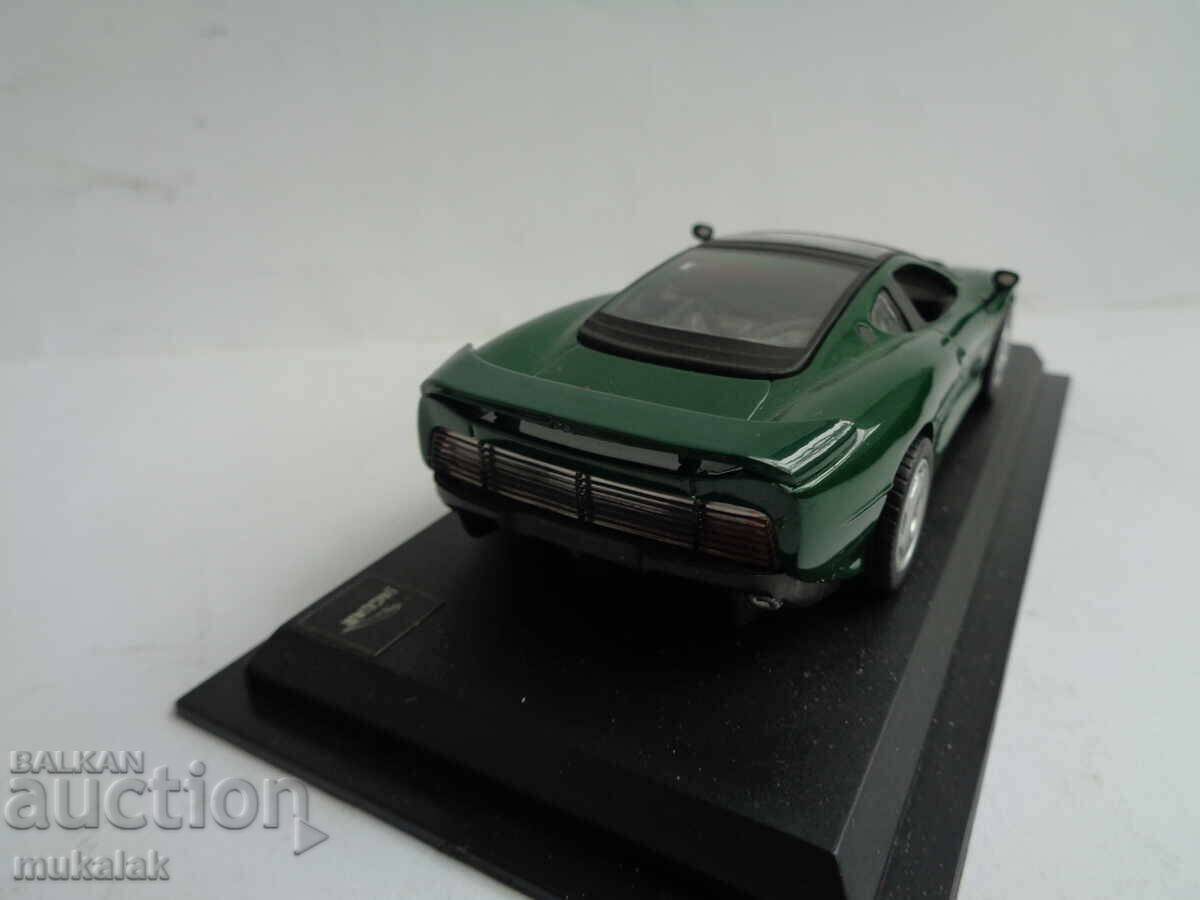 Delivery of 1:43 JAGUAR XJ 220 TROLLEY TOY MODEL Delivery of 1:43 JAGUAR XJ 220 TROLLEY TOY MODEL
