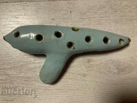 Old ceramic whistle ocarina master