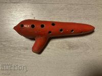 Old ceramic whistle ocarina master