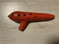 Old ceramic whistle ocarina master