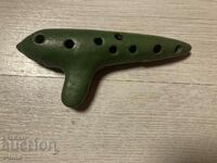 Old ceramic whistle ocarina master