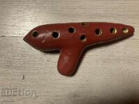 Old ceramic whistle ocarina master