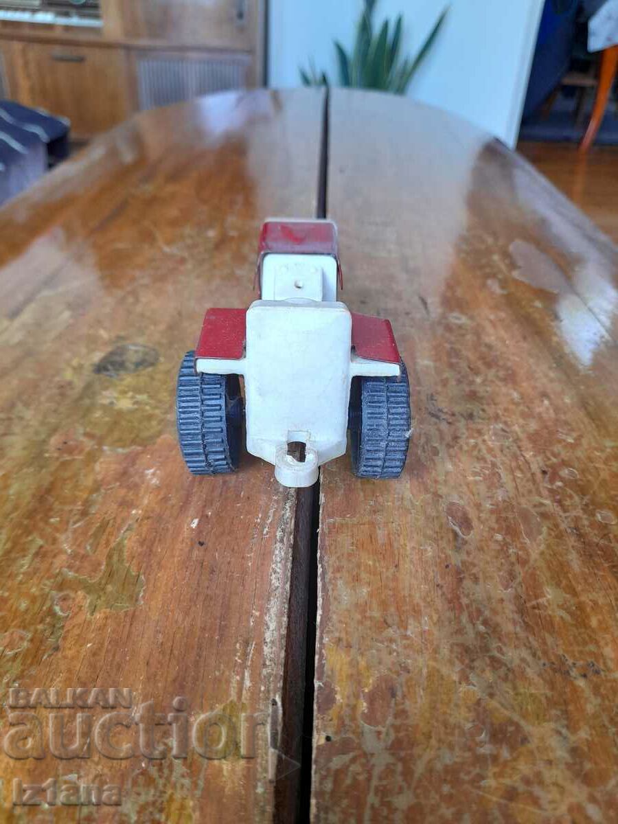 Delivery of Old toy tractor Delivery of Old toy tractor