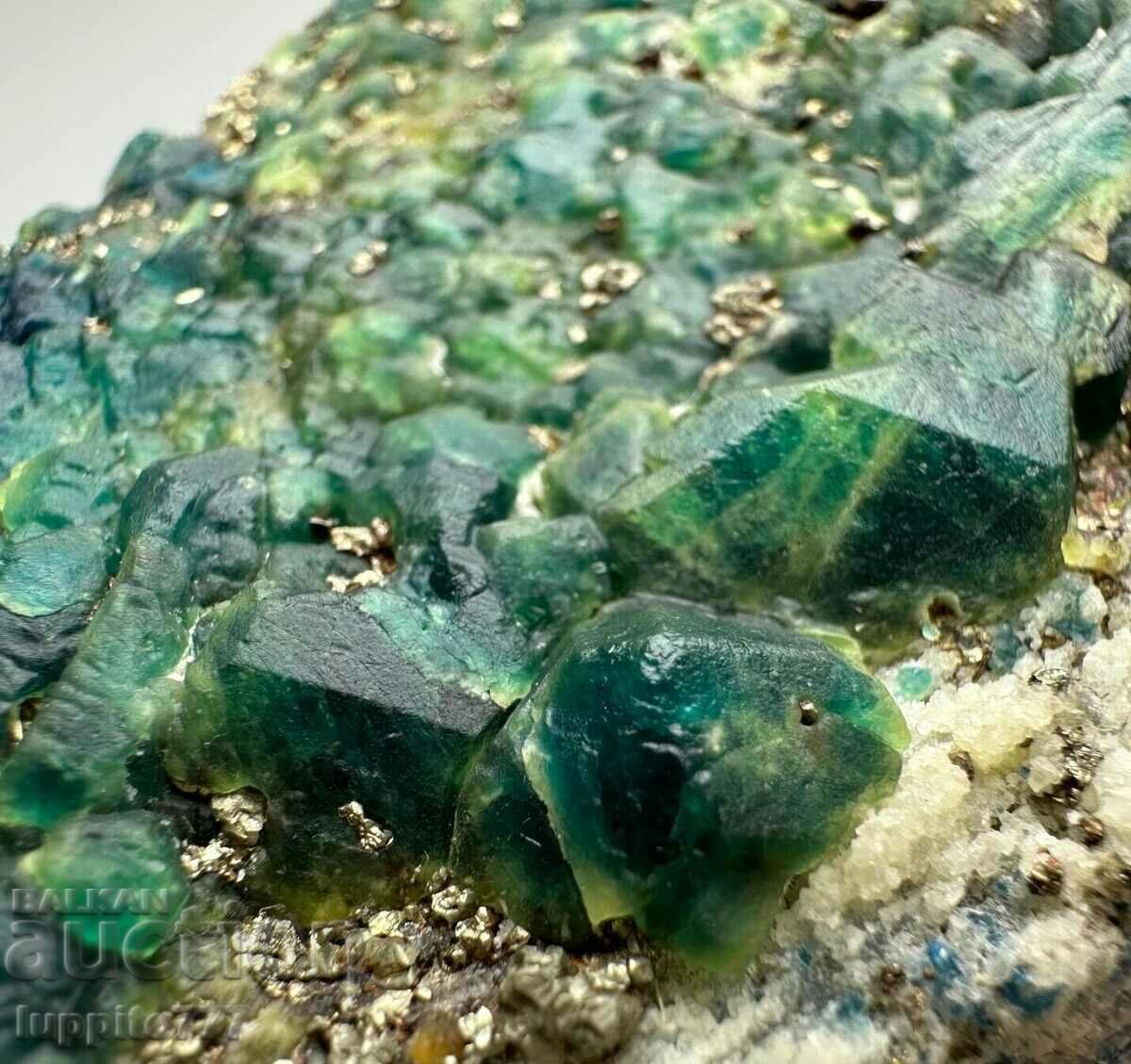 751 grams of natural green tourmaline on a unique matrix