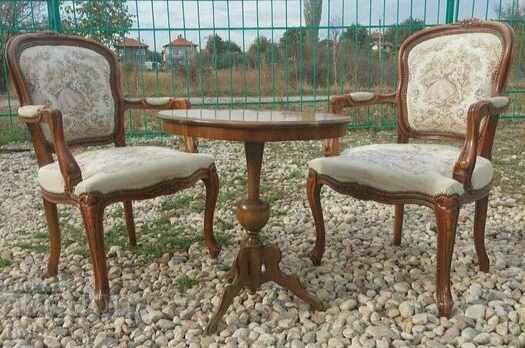 Set of two chairs with a table