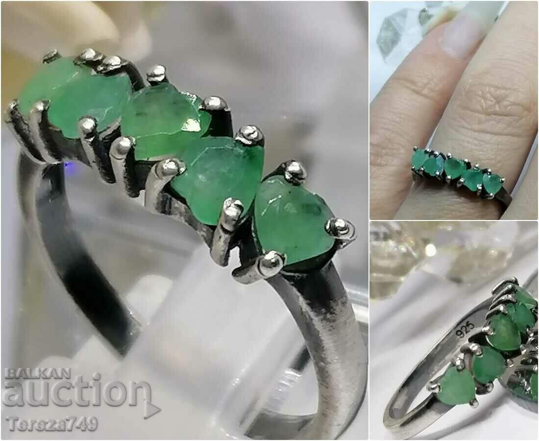 Silver ring with emeralds and emeralds