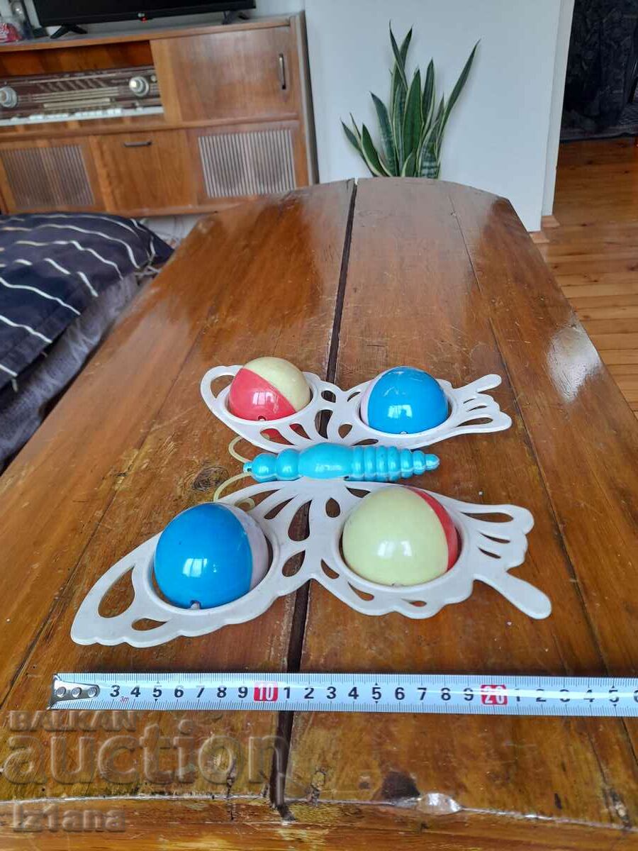 Delivery of Old toy rattle Butterfly Delivery of Old toy rattle Butterfly