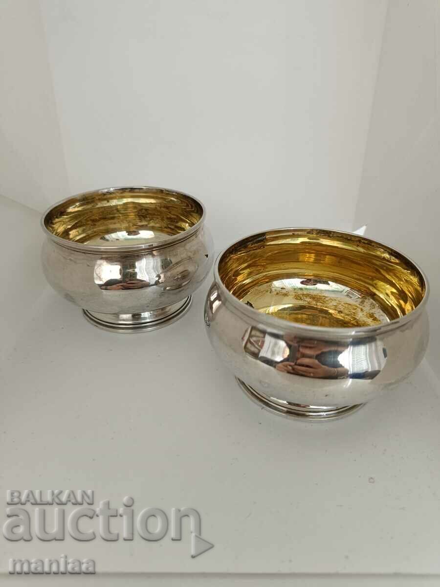 Set of silver wine glasses with gilding