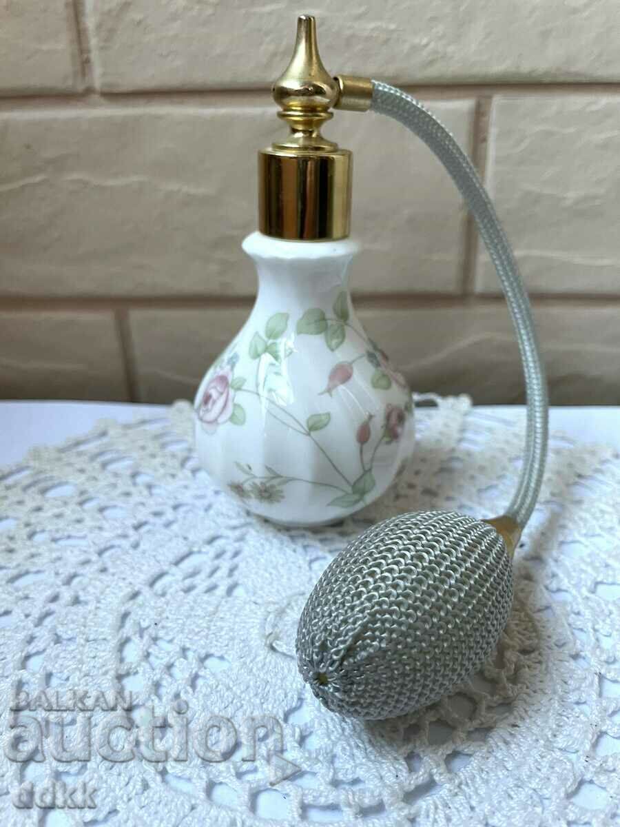 A beautiful bone china perfume bottle from England