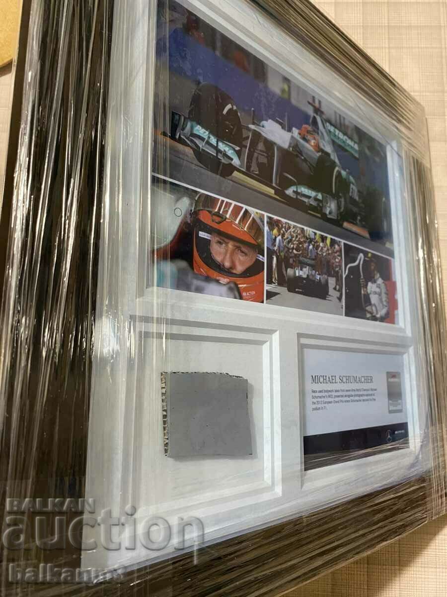 Livrarea O parte din mașina lui Michael Schumacher (Formula 1) Livrarea O parte din mașina lui Michael Schumacher (Formula 1)