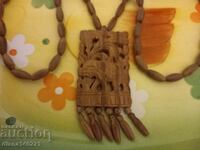 Long wooden necklace exotic and interesting.