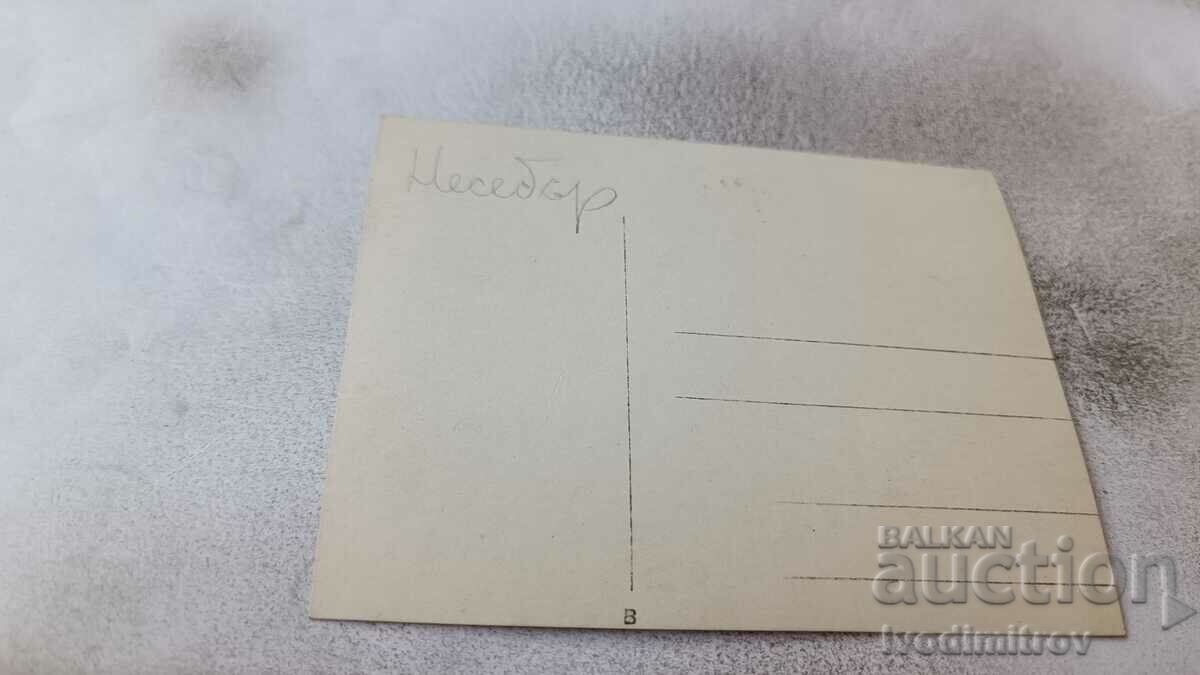 Photo Nessebar Young men and women on rocks by the sea with price 2.65 BGN | € 1.35 Photo Nessebar Young men and women on rocks by the sea with price 2.65 BGN | € 1.35