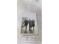 Photo Sofia A man and two women in front of the Courthouse 1944