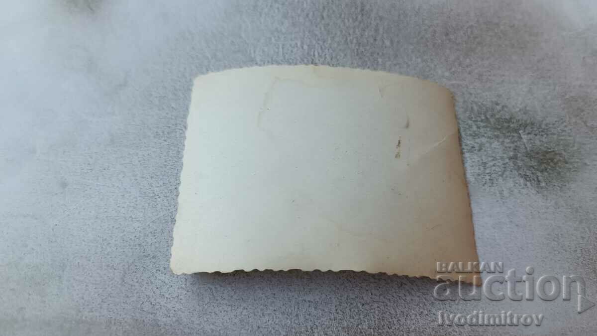 Photo Three men and a woman in swimsuits sitting on the dune with price 1.85 BGN | € 0.95 Photo Three men and a woman in swimsuits sitting on the dune with price 1.85 BGN | € 0.95