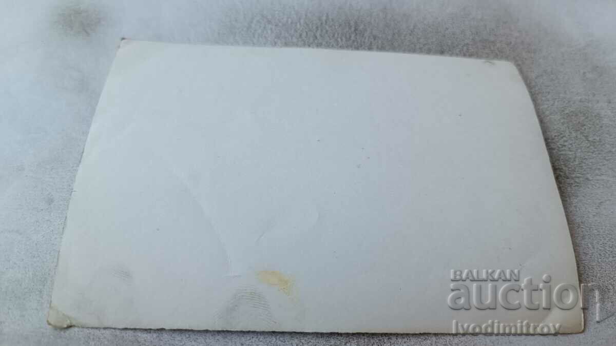 Photo Three men in swimsuits on a rock by the sea with price 1.75 BGN | € 0.89