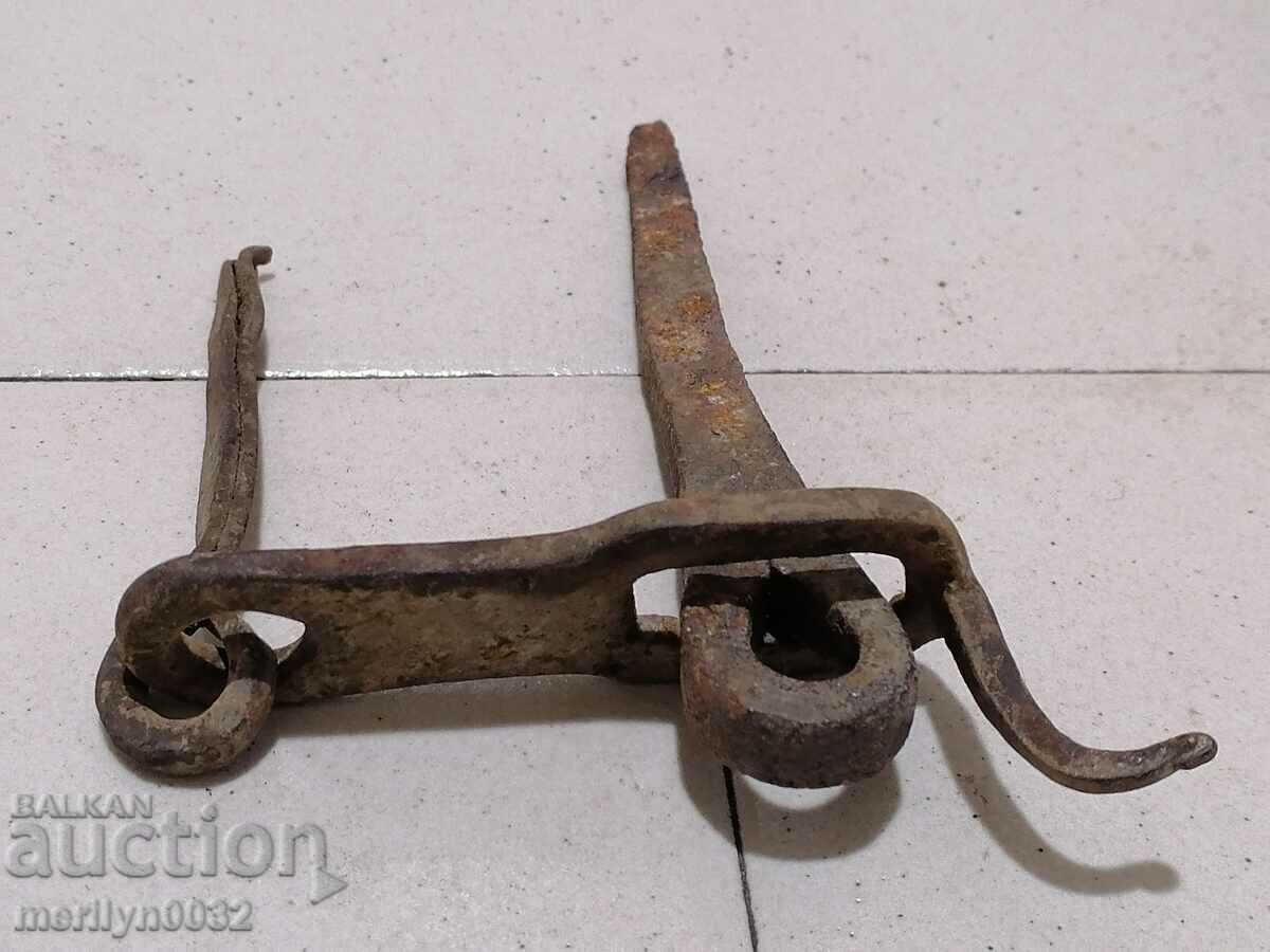 Old carved wrought iron padlock primitive chain Old carved wrought iron padlock primitive chain