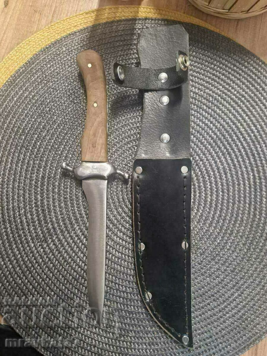 An old knife with a cane