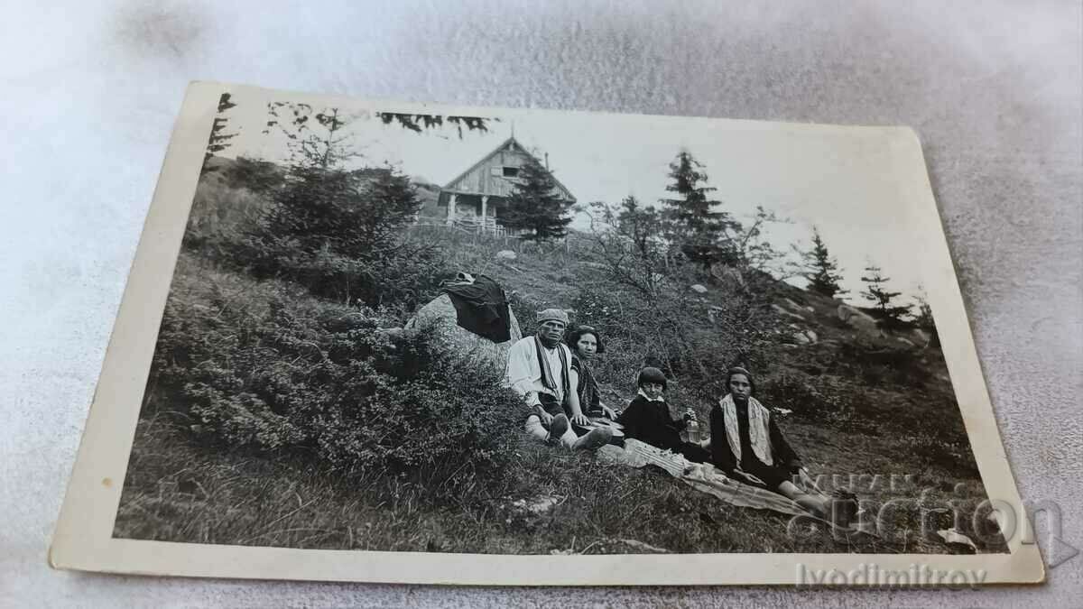 Mrs. Vitosha A man and three children on a picnic in front of the Fonfon' hut 1930 Mrs. Vitosha A man and three children on a picnic in front of the Fonfon' hut 1930