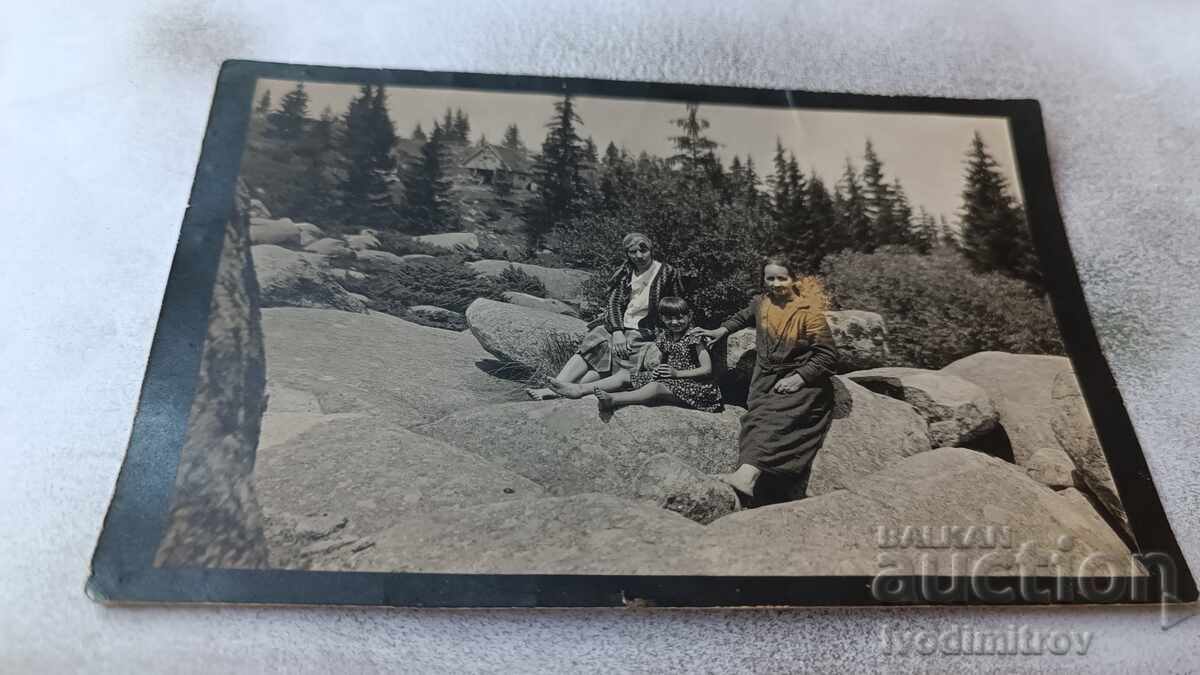 Ms. Vitosha Two women and a girl on stones in front of h. Fonfon 1926 Ms. Vitosha Two women and a girl on stones in front of h. Fonfon 1926