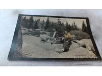 Ms. Vitosha Two women and a girl on stones in front of h. Fonfon 1926