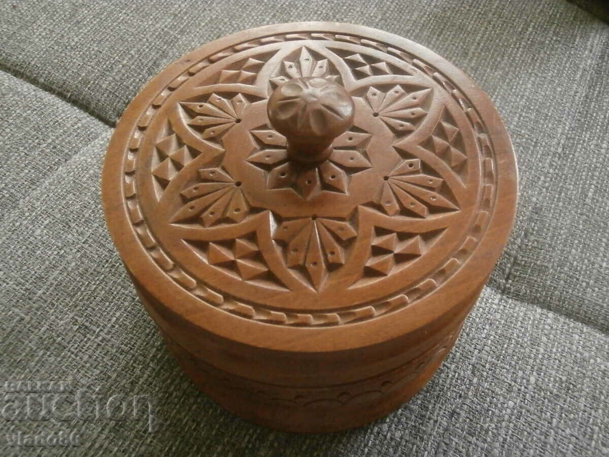 Round wooden cigarette box with carving
