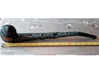 Giant antique sachan pipe and wood