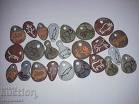 AMULETS. PENDANTS. DRAWINGS ON STONES