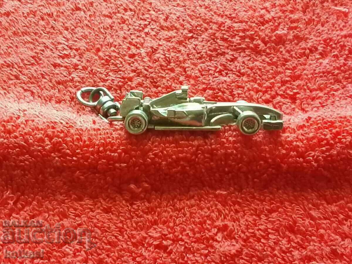 Delivery of Vintage Ferrari Shell Metal Keychain Delivery of Vintage Ferrari Shell Metal Keychain
