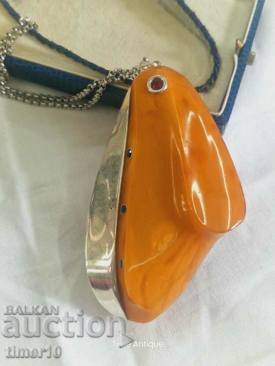 Unique amber pendant with silver, ruby and sapphire