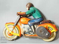 Old Russian metal toy model motorcycle with biker