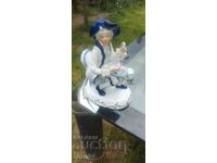 PORCELAIN STATUETTE