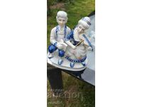 PORCELAIN STATUETTE