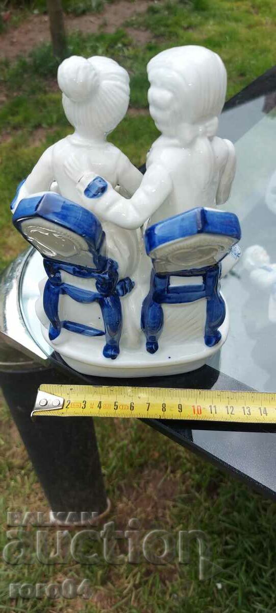 Auction  PORCELAIN STATUETTE