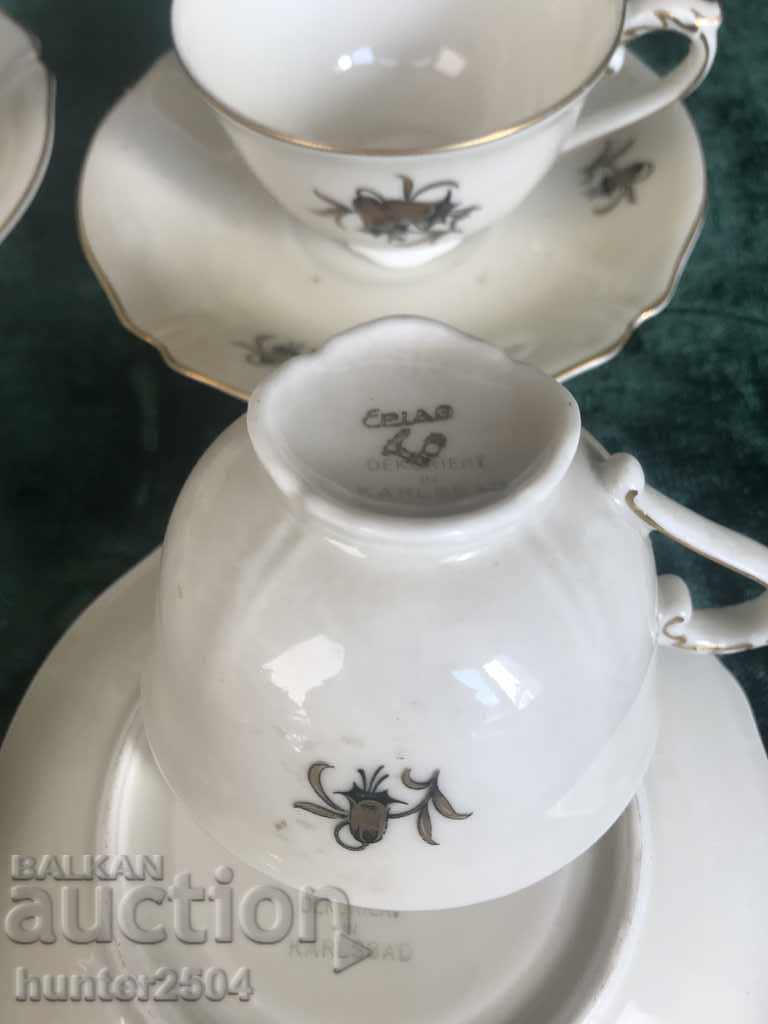 Auction Old bone china cups and saucers, marked Auction Old bone china cups and saucers, marked