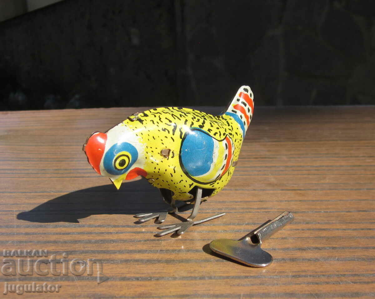 Auction  Russian metal sheet metal mechanical toy hen with key