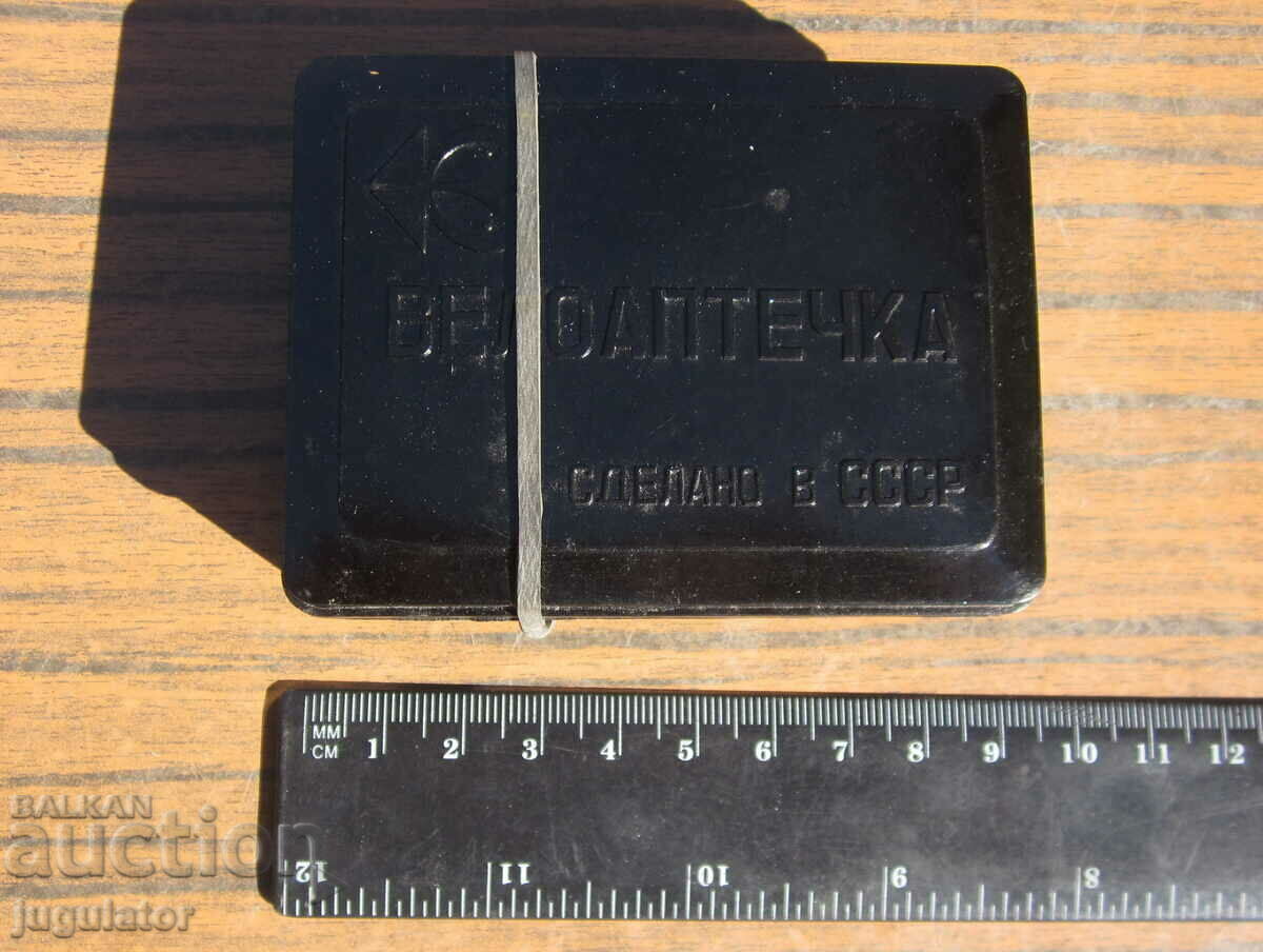 Delivery of old Russian bicycle first aid box for retro bicycle wheel