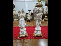 A great pair of antique porcelain figures