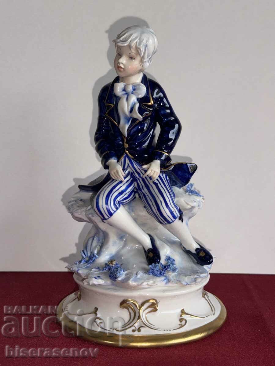 A uniquely beautiful porcelain figure with markings