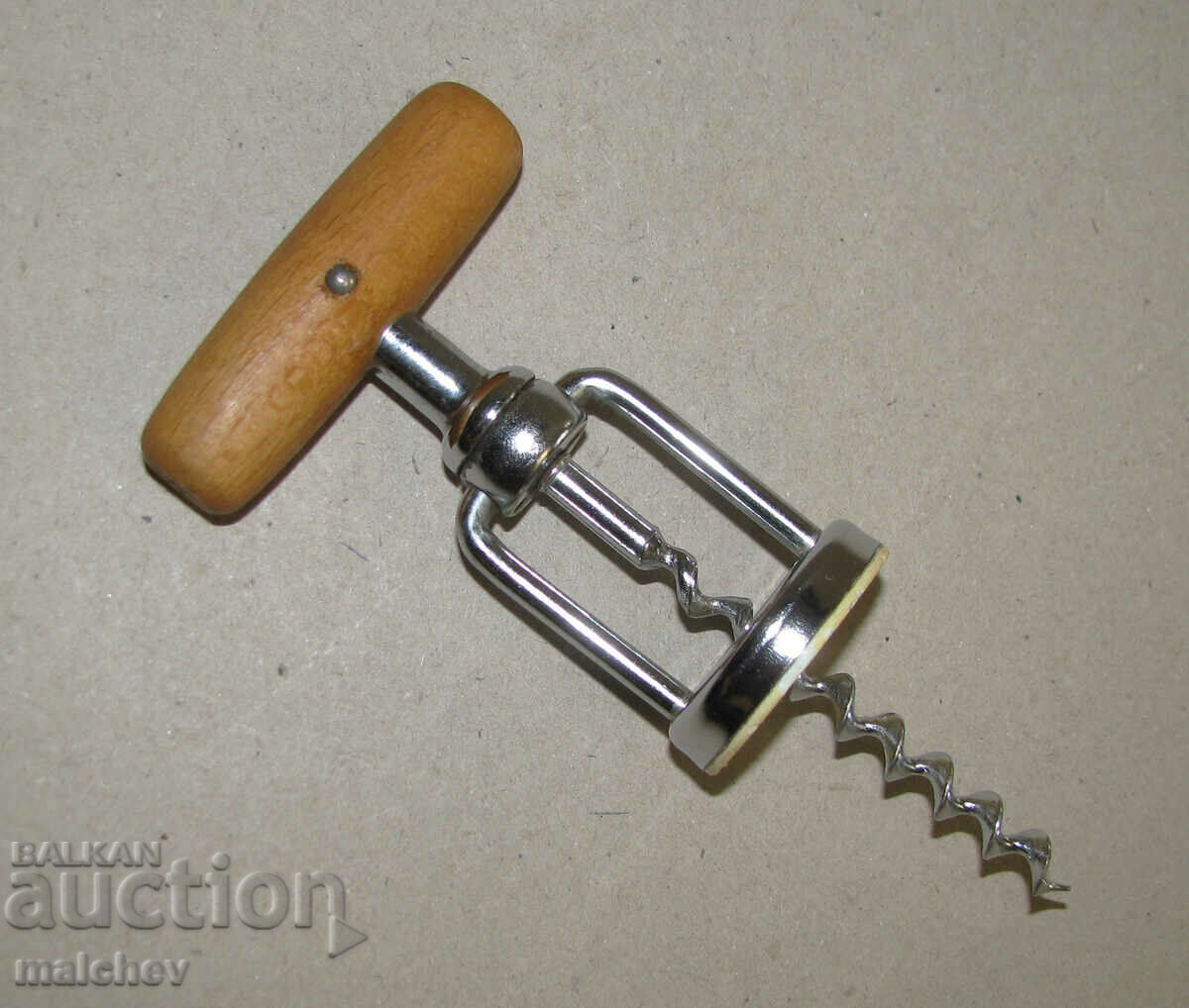 Corkscrew with wooden handle, preserved