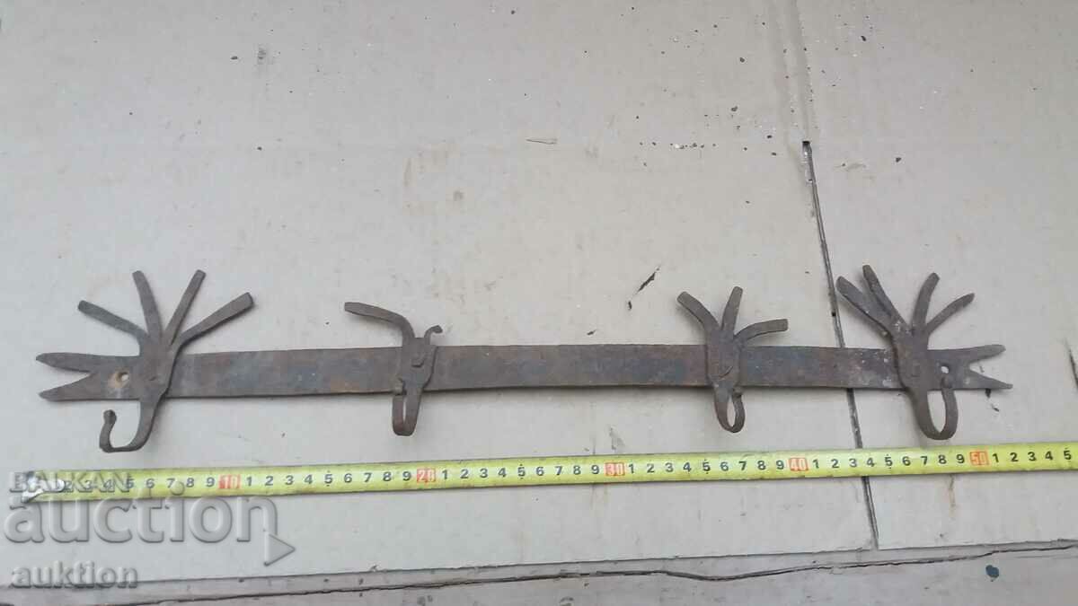 old wrought iron hanger