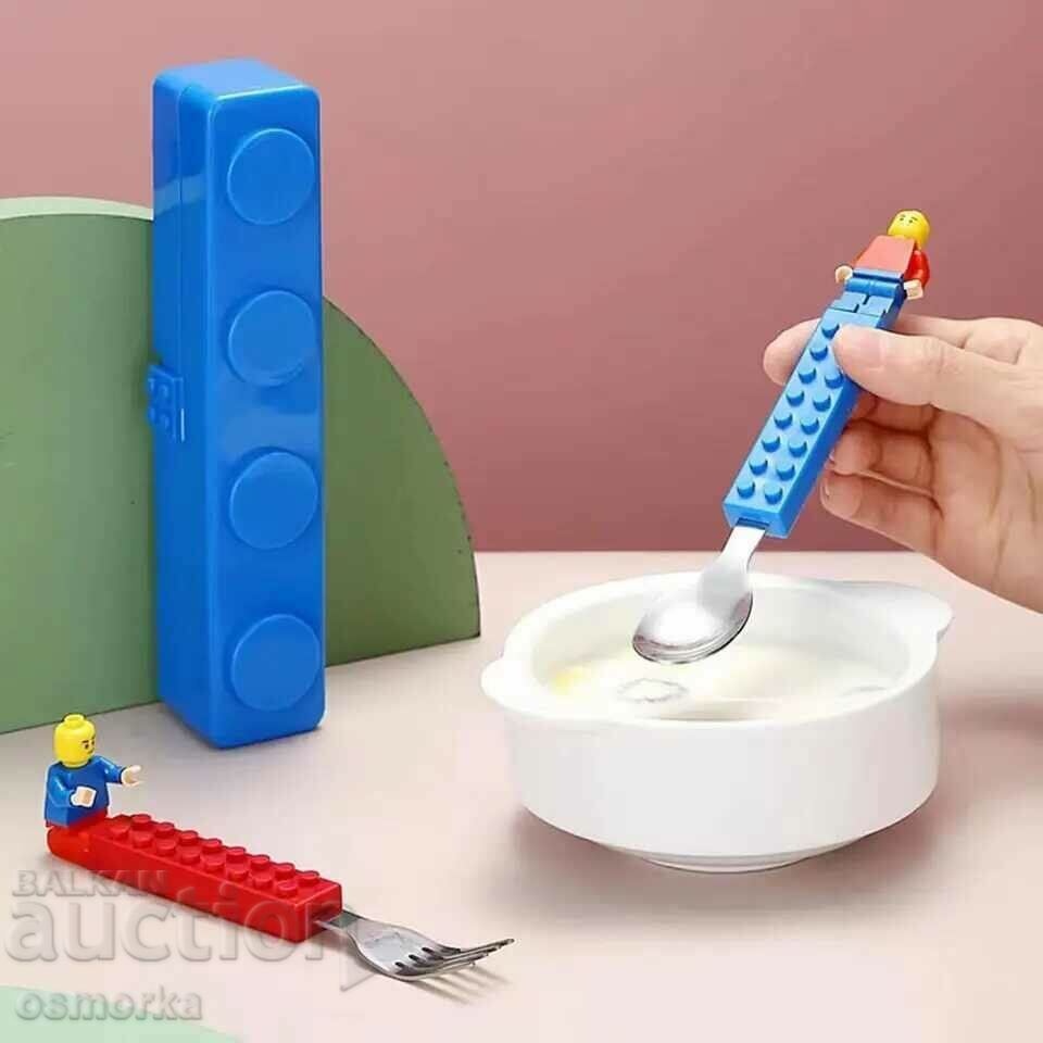 Delivery of Spoon and fork with a handle in the shape of a Lego block Delivery of Spoon and fork with a handle in the shape of a Lego block