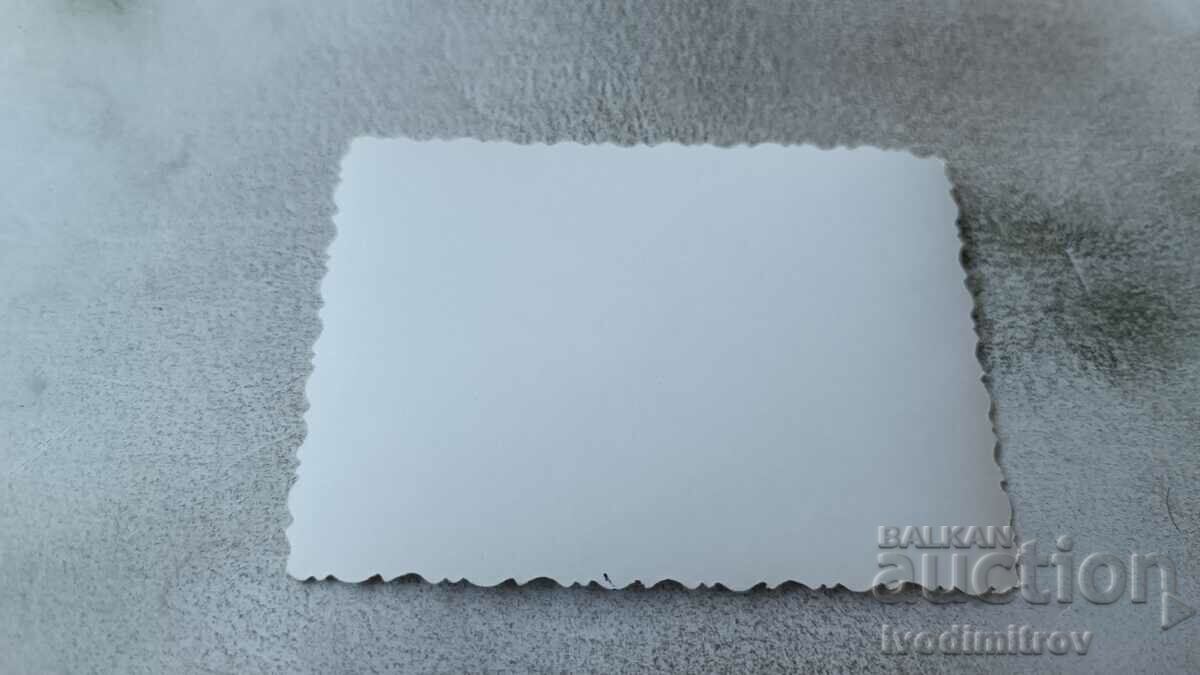 Photo Man in a swimsuit with sunglasses on the beach with price 2.35 BGN | € 1.20 Photo Man in a swimsuit with sunglasses on the beach with price 2.35 BGN | € 1.20