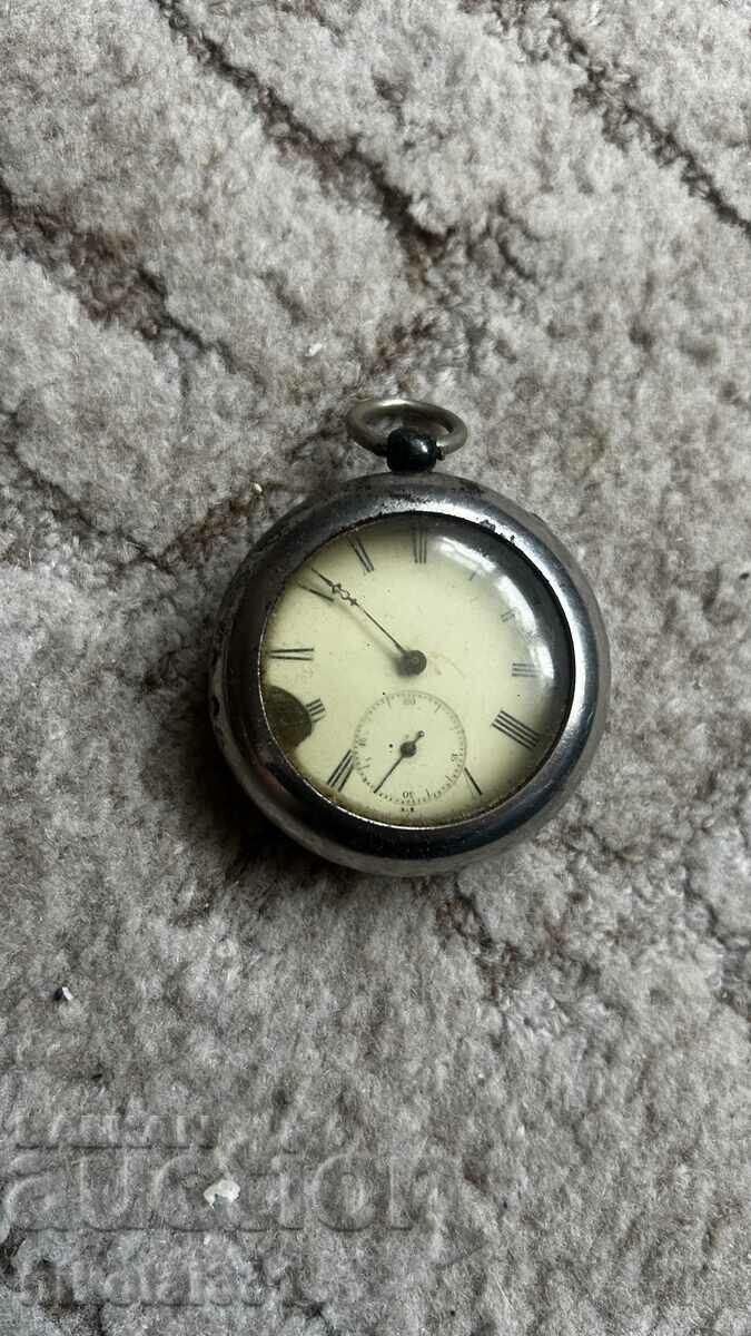 An interesting pocket watch, with a metal cover