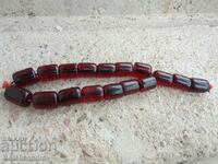 Old rosary with large red links