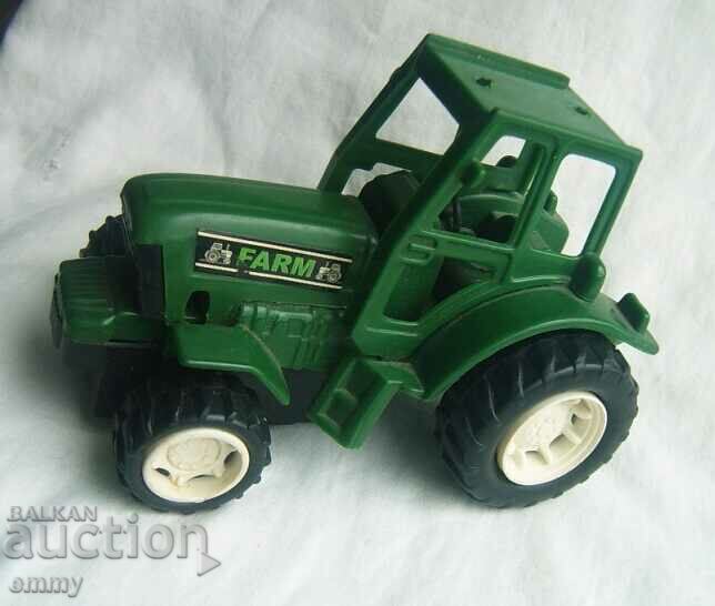 Plastic toy tractor - "Li Tian" with price 15.00 BGN | € 7.67 Plastic toy tractor - "Li Tian" with price 15.00 BGN | € 7.67