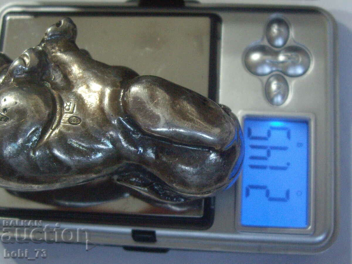 Delivery of Silver Bottle Stopper Dog. Delivery of Silver Bottle Stopper Dog.