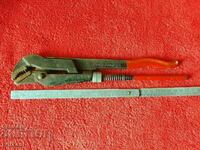Old metal plumbing wrench master