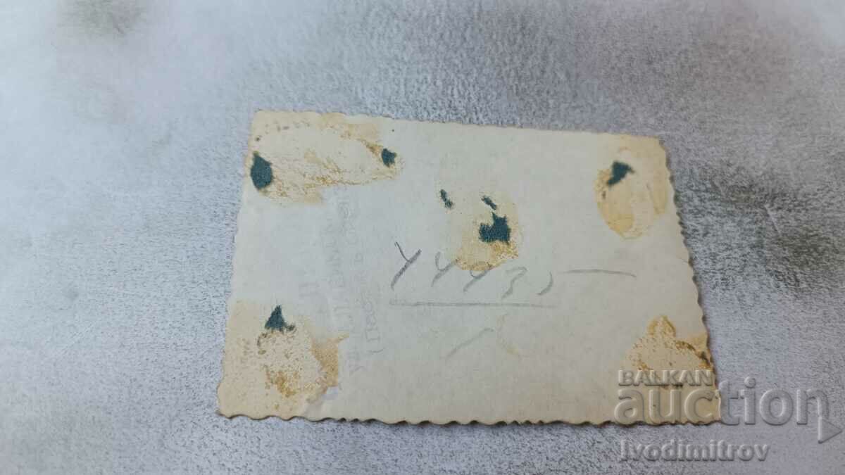 Photo Sofia A man and a woman with a retro baby carriage on the sidewalk with price 2.45 BGN | € 1.25